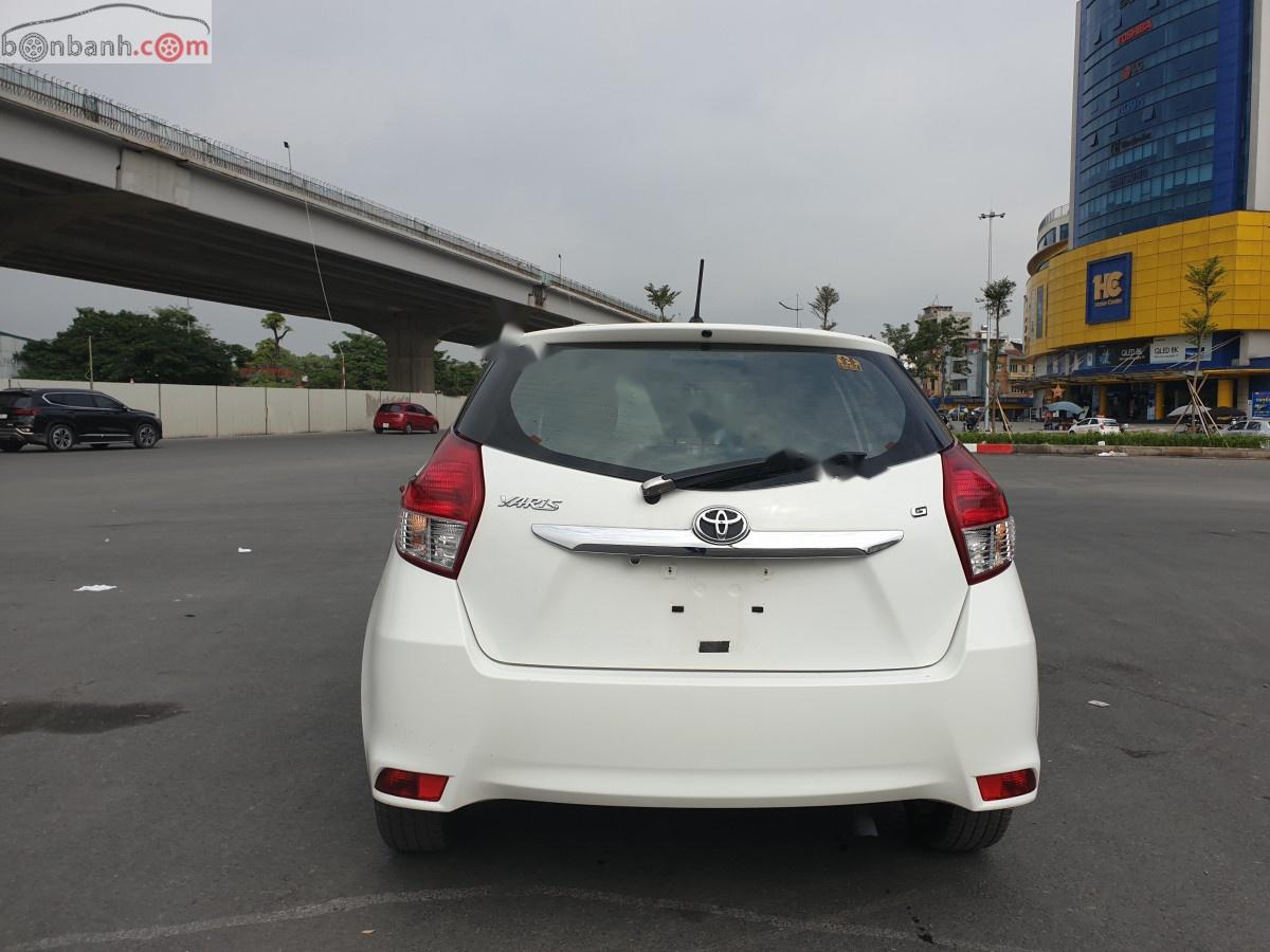 Toyota Yaris 1.3G 2014 - Cần bán xe Toyota Yaris 1.3G sản xuất 2014, màu trắng, xe nhập