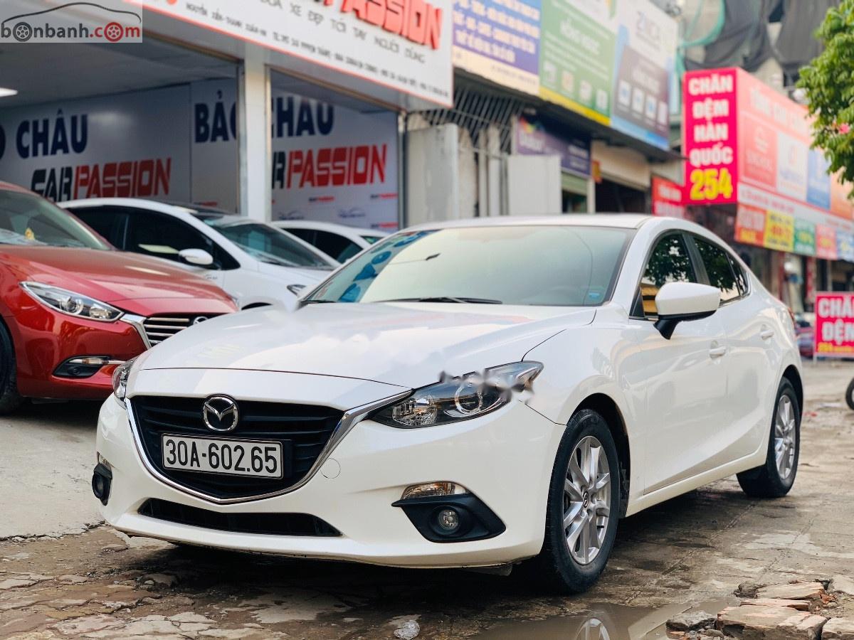 Mazda 3   2015 - Cần bán gấp Mazda 3 1.5 AT năm sản xuất 2015, màu trắng