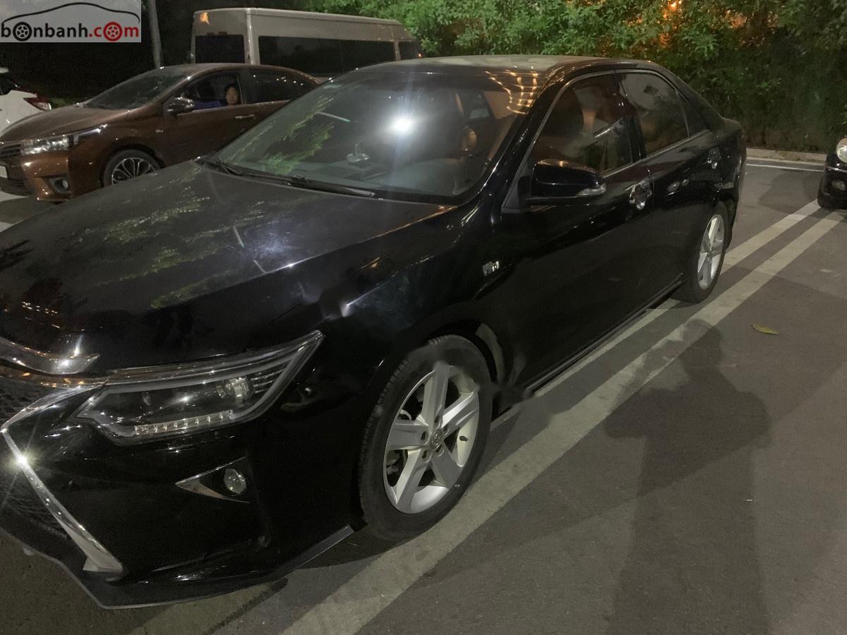 Toyota Camry 2015 - Cần bán Toyota Camry đời 2015, màu đen giá chỉ 825 triệu xe còn mới