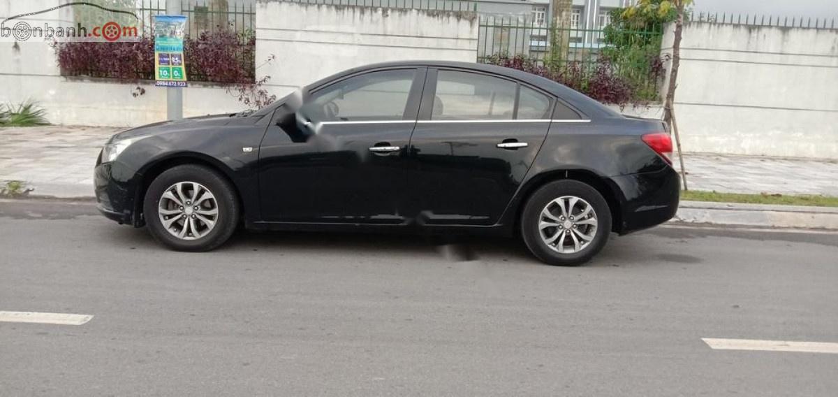 Chevrolet Cruze LS 1.6 MT 2010 - Xe Chevrolet Cruze LS 1.6 MT đời 2010, màu đen xe gia đình