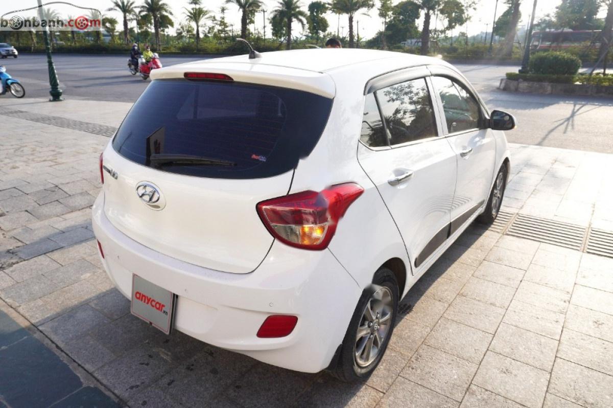 Hyundai Grand i10   1.0 AT 2015 - Bán Hyundai Grand i10 1.0 AT sản xuất 2015, màu trắng, nhập khẩu chính chủ