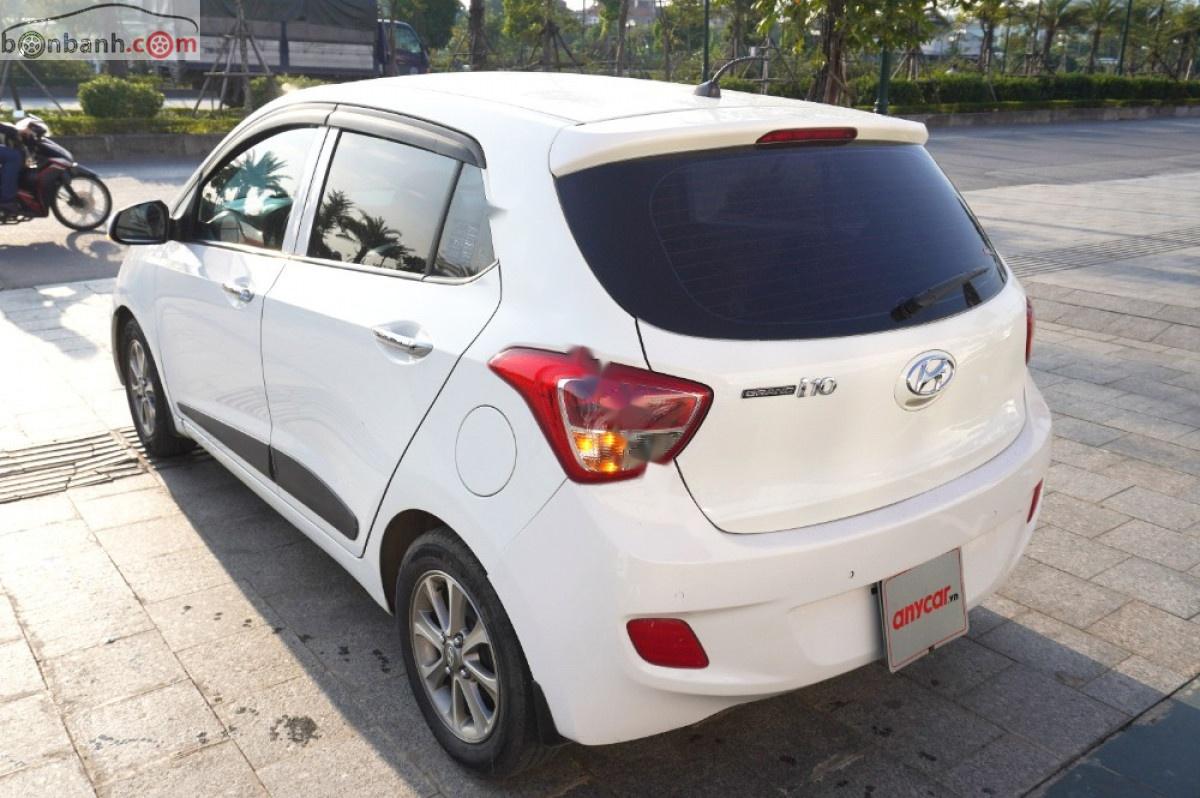 Hyundai Grand i10   1.0 AT 2015 - Bán Hyundai Grand i10 1.0 AT sản xuất 2015, màu trắng, nhập khẩu chính chủ