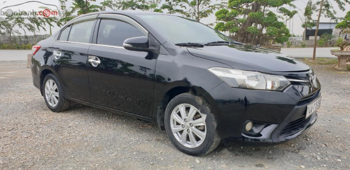 Toyota Vios 1.5E 2014 - Cần bán lại Toyota Vios E năm sản xuất 2014, màu đen, số sàn