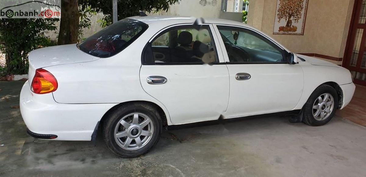 Kia Spectra   2003 - Bán Kia Spectra 1.6 MT năm 2003, màu trắng, xe gia đình