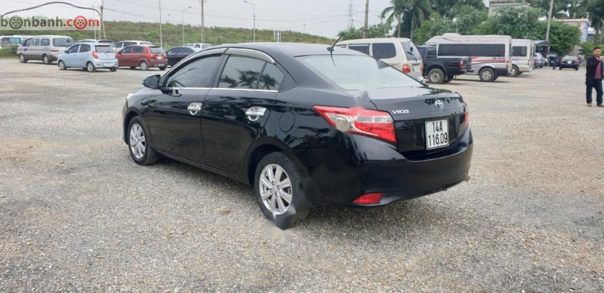 Toyota Vios 1.5E 2014 - Cần bán lại Toyota Vios E năm sản xuất 2014, màu đen, số sàn