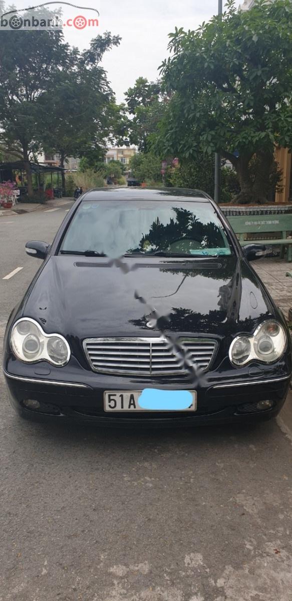 Mercedes-Benz C class C200 Kompressor MT 2003 - Cần bán gấp Mercedes C200 Kompressor MT đời 2003, màu đen còn mới giá cạnh tranh