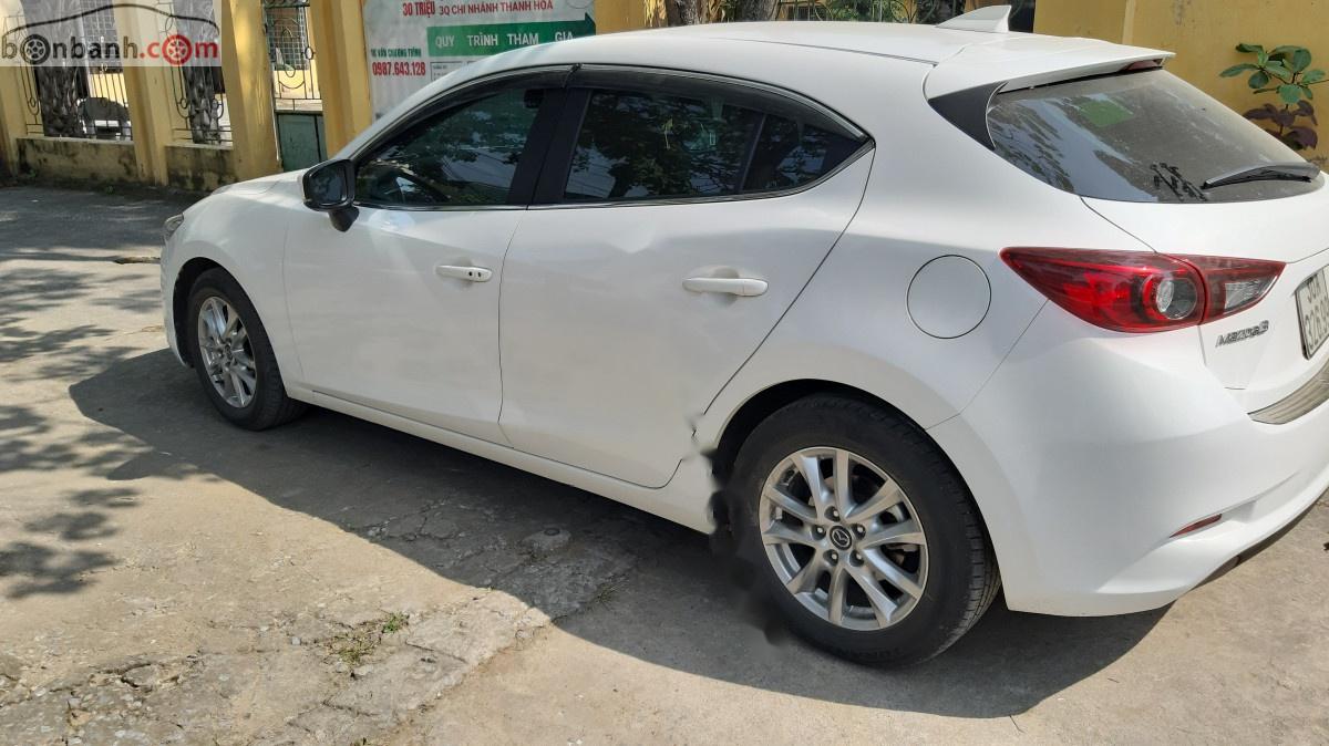 Mazda 3 1.5 AT 2018 - Cần bán lại xe Mazda 3 1.5 AT sản xuất năm 2018, màu trắng còn mới