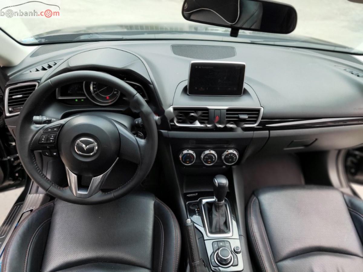 Mazda 3 C 2016 - Cần bán xe Mazda 3 C sản xuất 2016, màu đen số tự động, 558 triệu