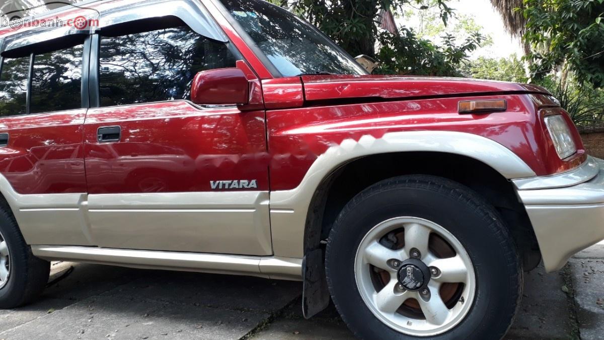 Suzuki Vitara 2005 - Bán xe Suzuki Vitara đời 2005, màu đỏ xe nguyên bản
