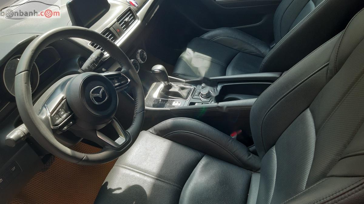 Mazda 3 1.5 AT 2018 - Cần bán lại xe Mazda 3 1.5 AT sản xuất năm 2018, màu trắng còn mới