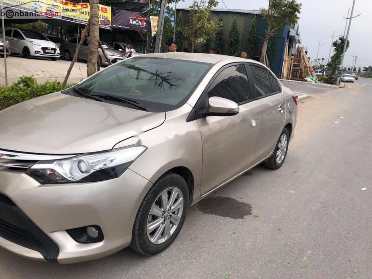 Toyota Vios   2015 - Cần bán xe cũ Toyota Vios 1.5G năm 2015, màu vàng