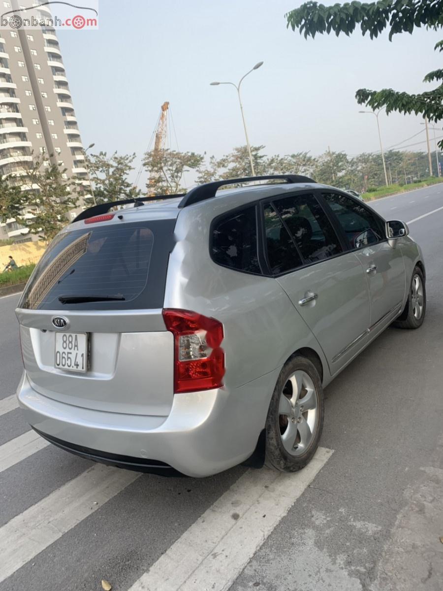 Kia Carens EX 2.0 MT 2009 - Cần bán gấp Kia Carens EX 2.0 MT đời 2009, màu bạc còn mới