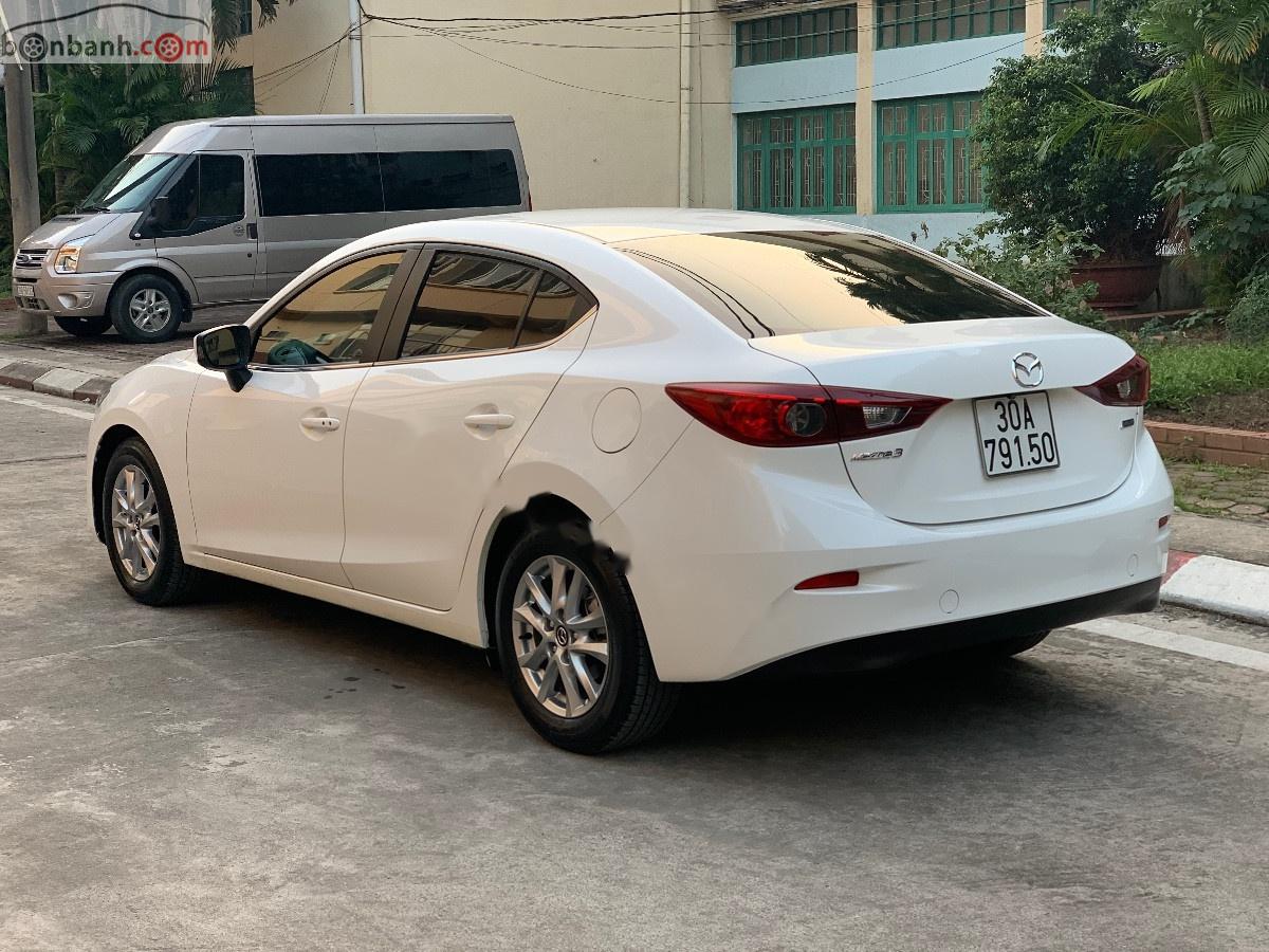 Mazda 3 2015 - Bán Mazda 3 sản xuất năm 2015, màu trắng, chính chủ, 565 triệu