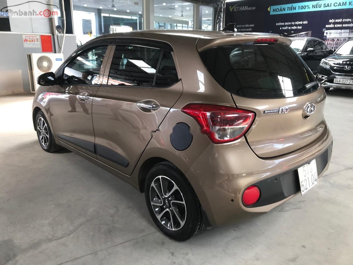 Hyundai Grand i10  1.2 AT 2017 - Bán Hyundai Grand i10 1.2AT 2017, màu nâu