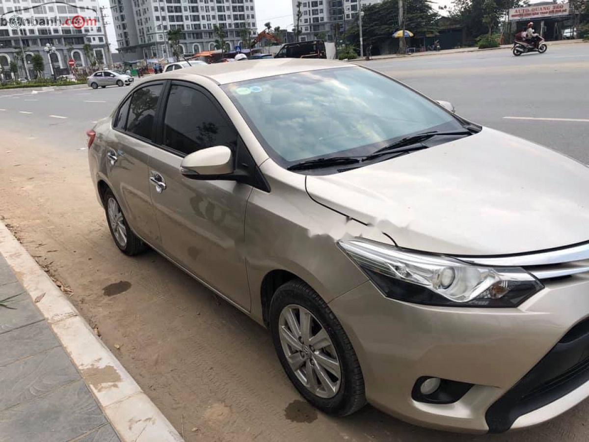 Toyota Vios   2015 - Cần bán xe cũ Toyota Vios 1.5G năm 2015, màu vàng