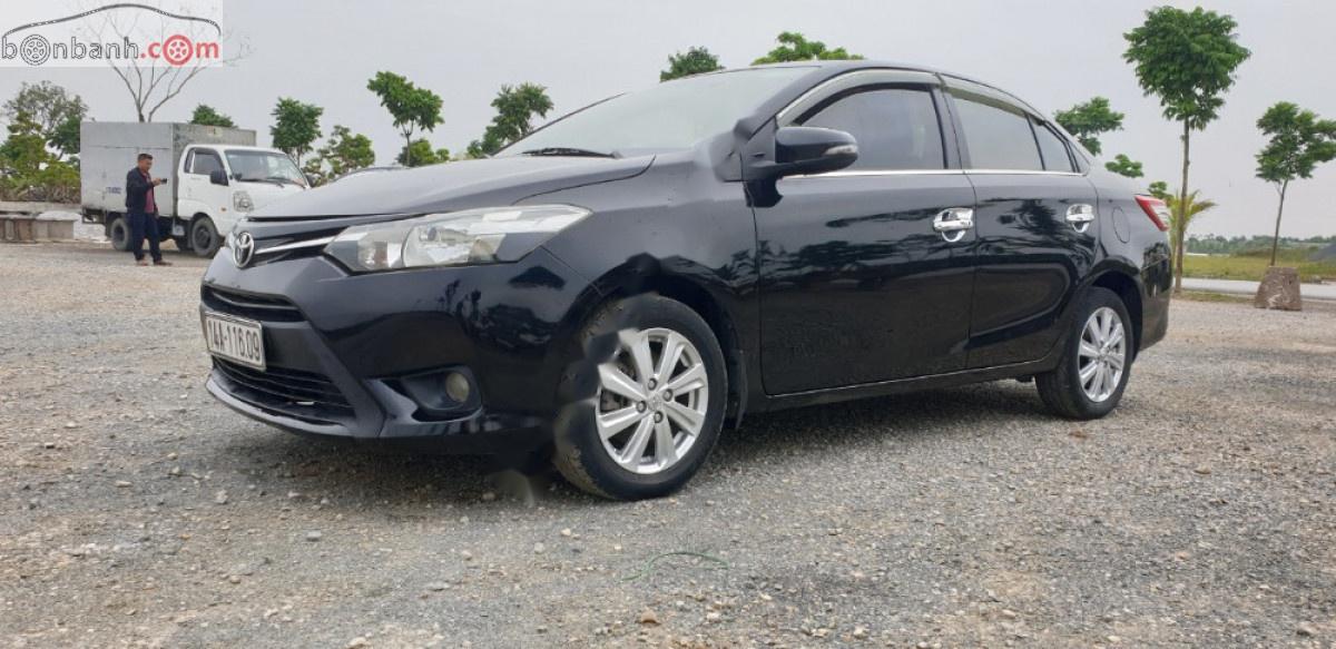 Toyota Vios 1.5E 2014 - Cần bán lại Toyota Vios E năm sản xuất 2014, màu đen, số sàn