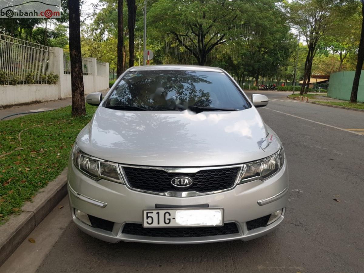 Kia Forte 2012 - Bán xe Kia Forte AT sản xuất năm 2012, màu bạc như mới