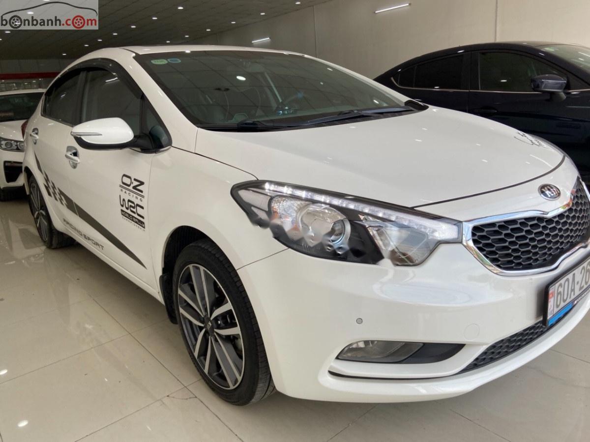 Kia K3 2015 - Cần bán Kia K3 đời 2015, màu trắng xe nguyên bản