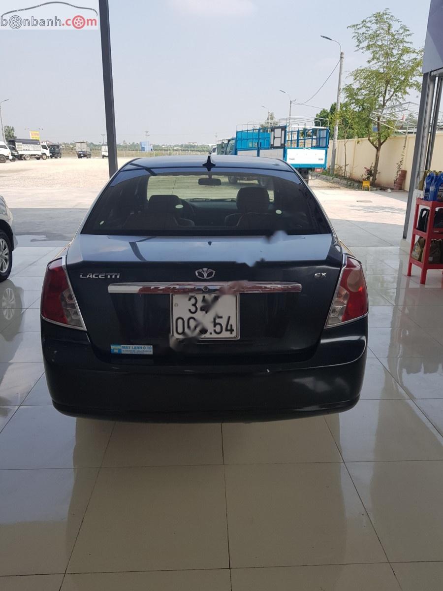 Daewoo Lacetti 2011 - Cần bán gấp Daewoo Lacetti sản xuất 2011, màu đen, 185tr