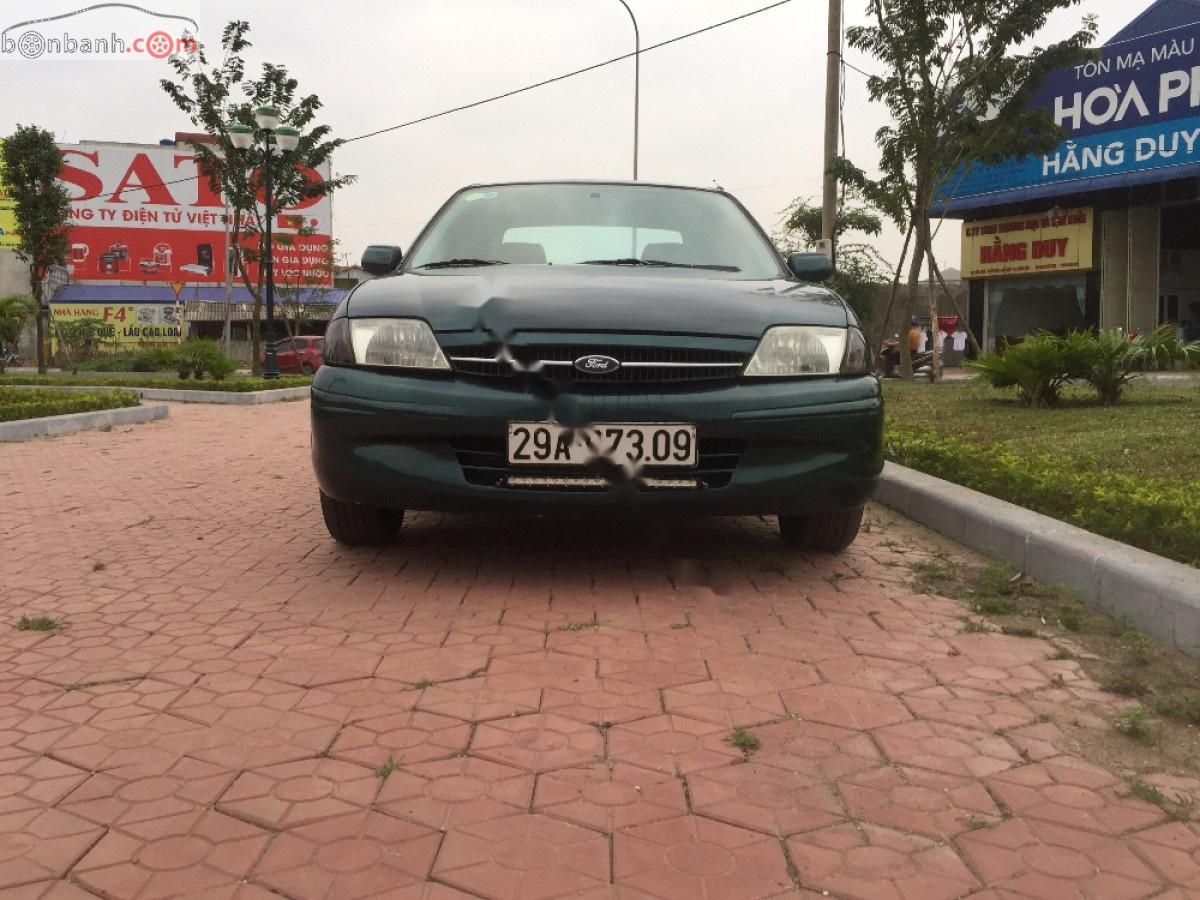 Ford Laser Delu 1.6 MT 2001 - Bán ô tô Ford Laser năm sản xuất 2001, màu xanh lam xe còn mới lắm