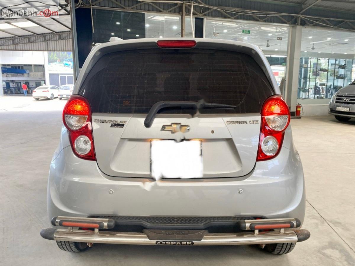 Chevrolet Spark 2014 - Bán Chevrolet Spark 2014, màu bạc, 258tr xe còn mới lắm