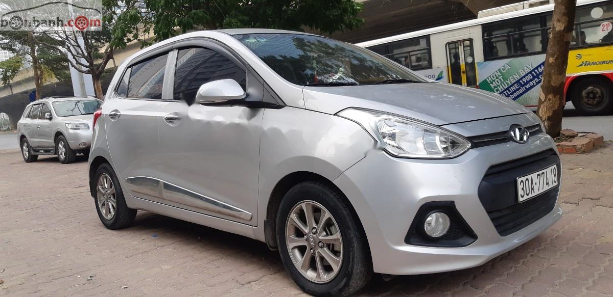 Hyundai Grand i10  1.2 AT 2015 - Bán Hyundai Grand i10 2015, màu bạc, nhập khẩu như mới, giá tốt