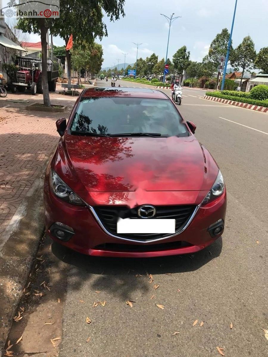 Mazda 3 1.5 AT 2015 - Bán Mazda 3 sản xuất 2015, màu đỏ, 550tr xe còn mới lắm