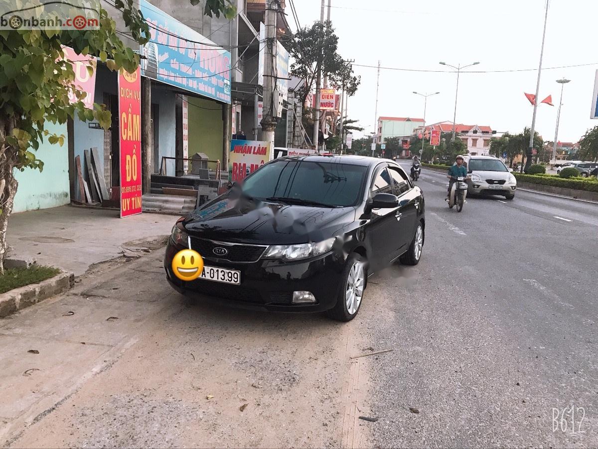 Kia Forte SX 1.6 MT 2011 - Bán xe Kia Forte SX 1.6 MT năm sản xuất 2011, màu đen xe gia đình