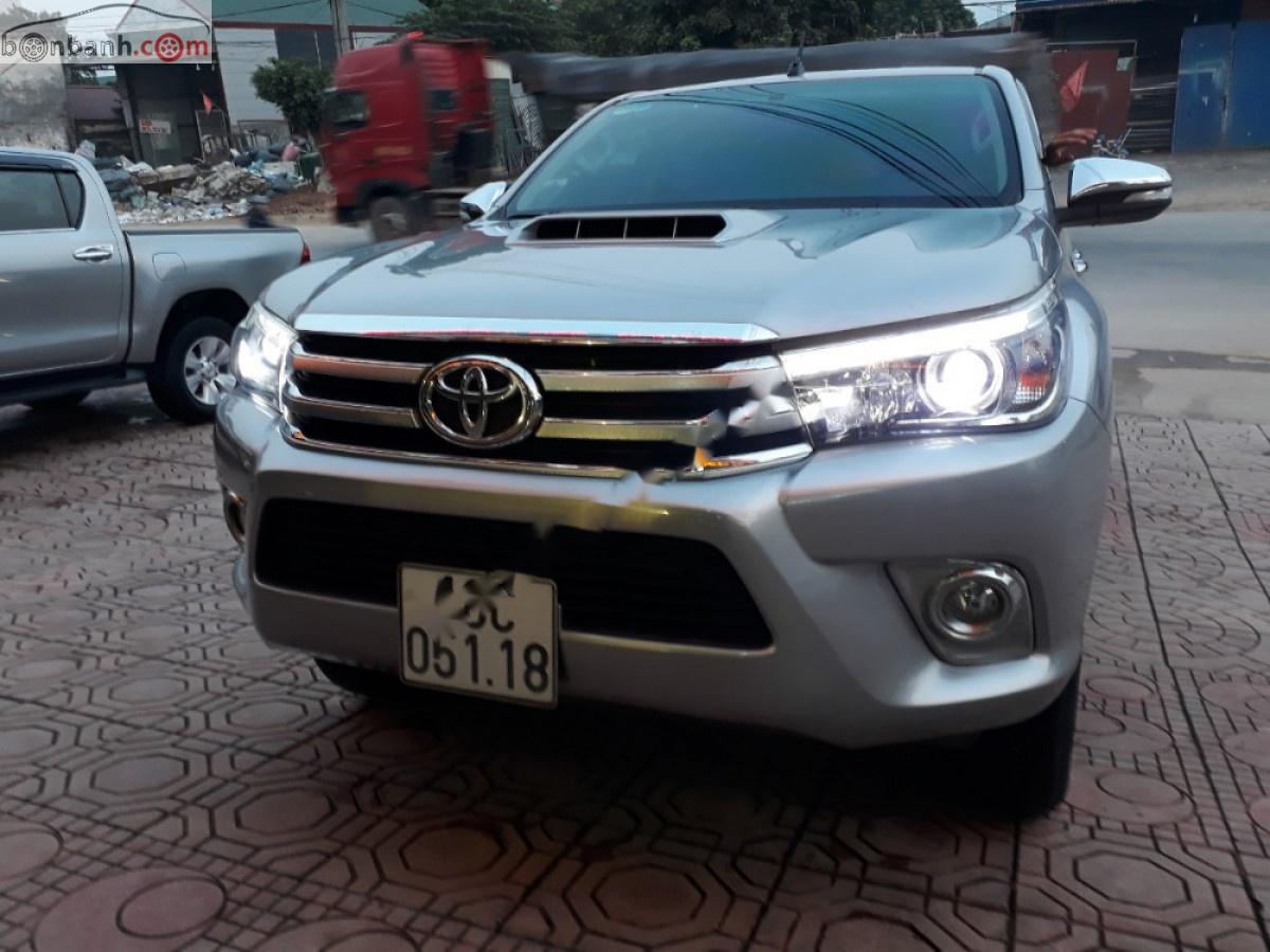 Toyota Hilux   2015 - Cần bán Toyota Hilux 3.0G 4x4 AT đời 2015, màu bạc, nhập khẩu 