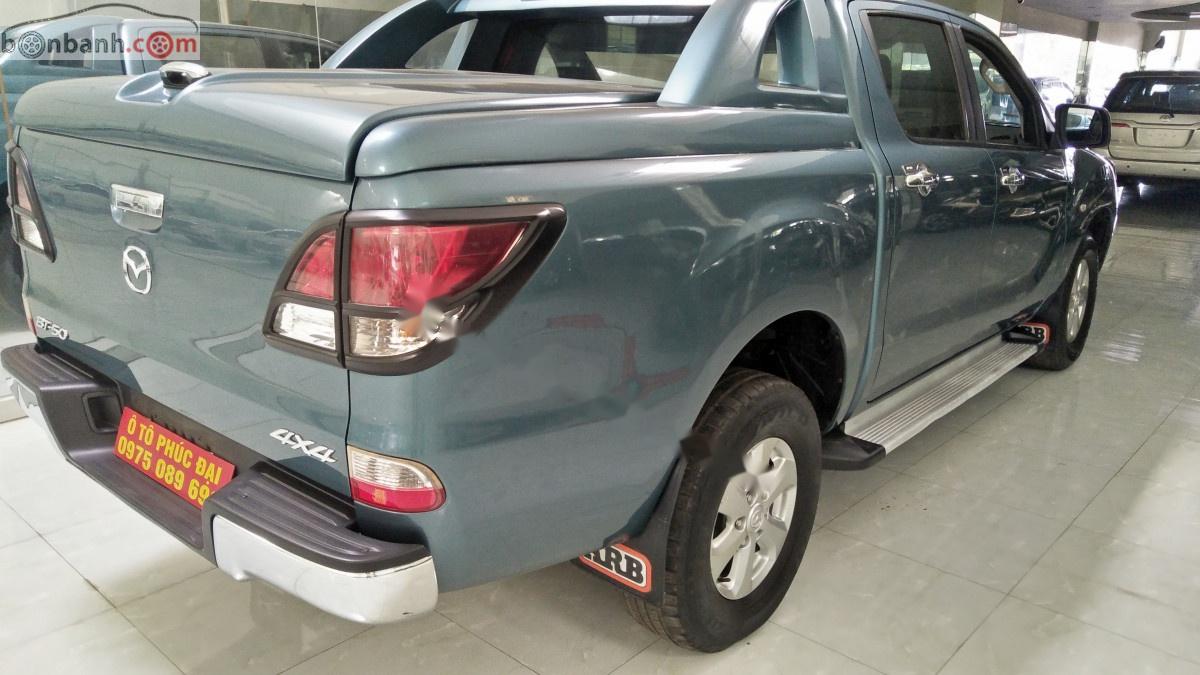 Mazda BT 50 2014 - Cần bán gấp Mazda BT 50 đời 2014, màu xanh lam, nhập khẩu nguyên chiếc chính hãng