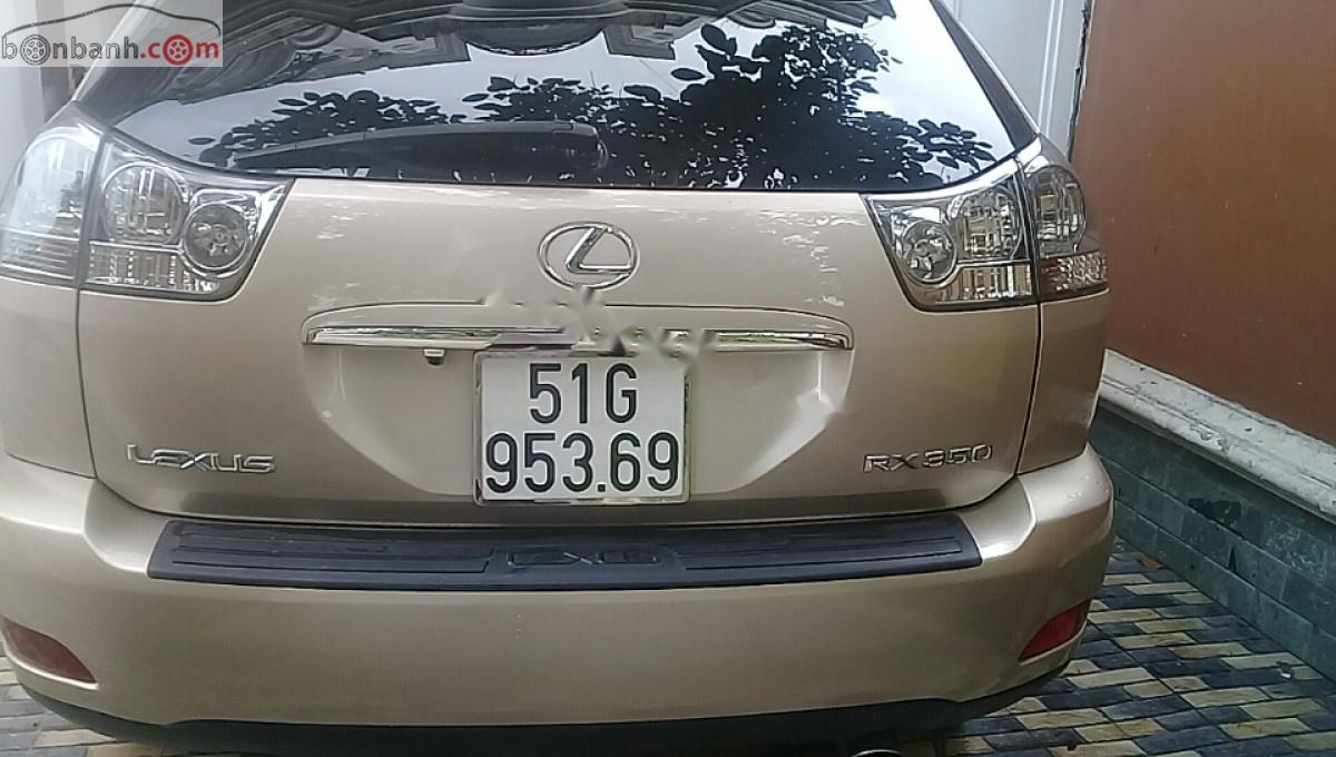 Lexus RX 350 AWD 2007 - Cần bán xe Lexus RX 350 AWD đời 2007, màu vàng, nhập khẩu, 690 triệu