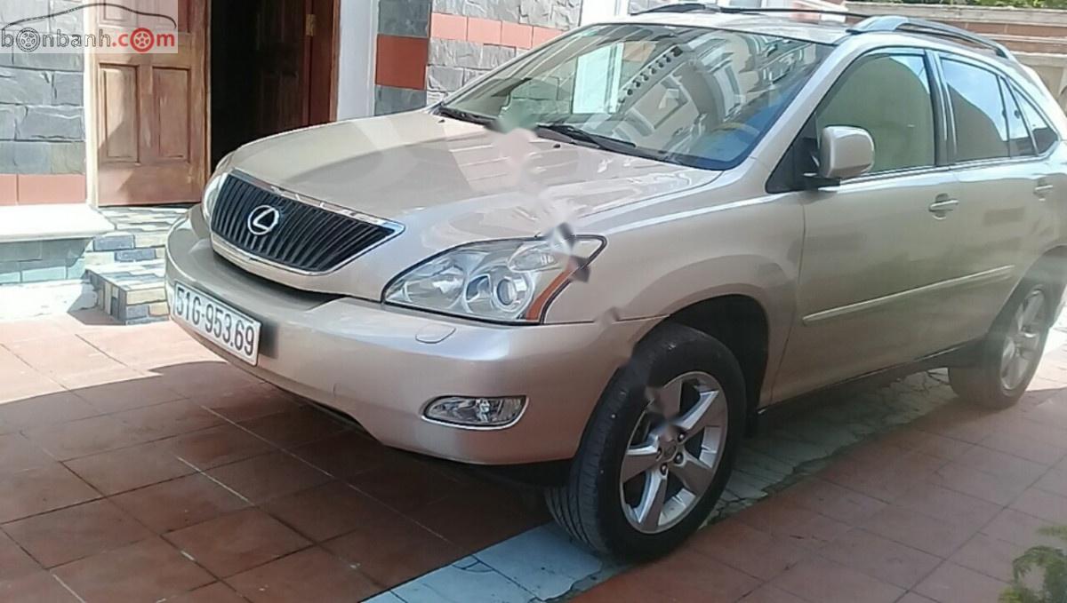 Lexus RX 350 AWD 2007 - Cần bán xe Lexus RX 350 AWD đời 2007, màu vàng, nhập khẩu, 690 triệu