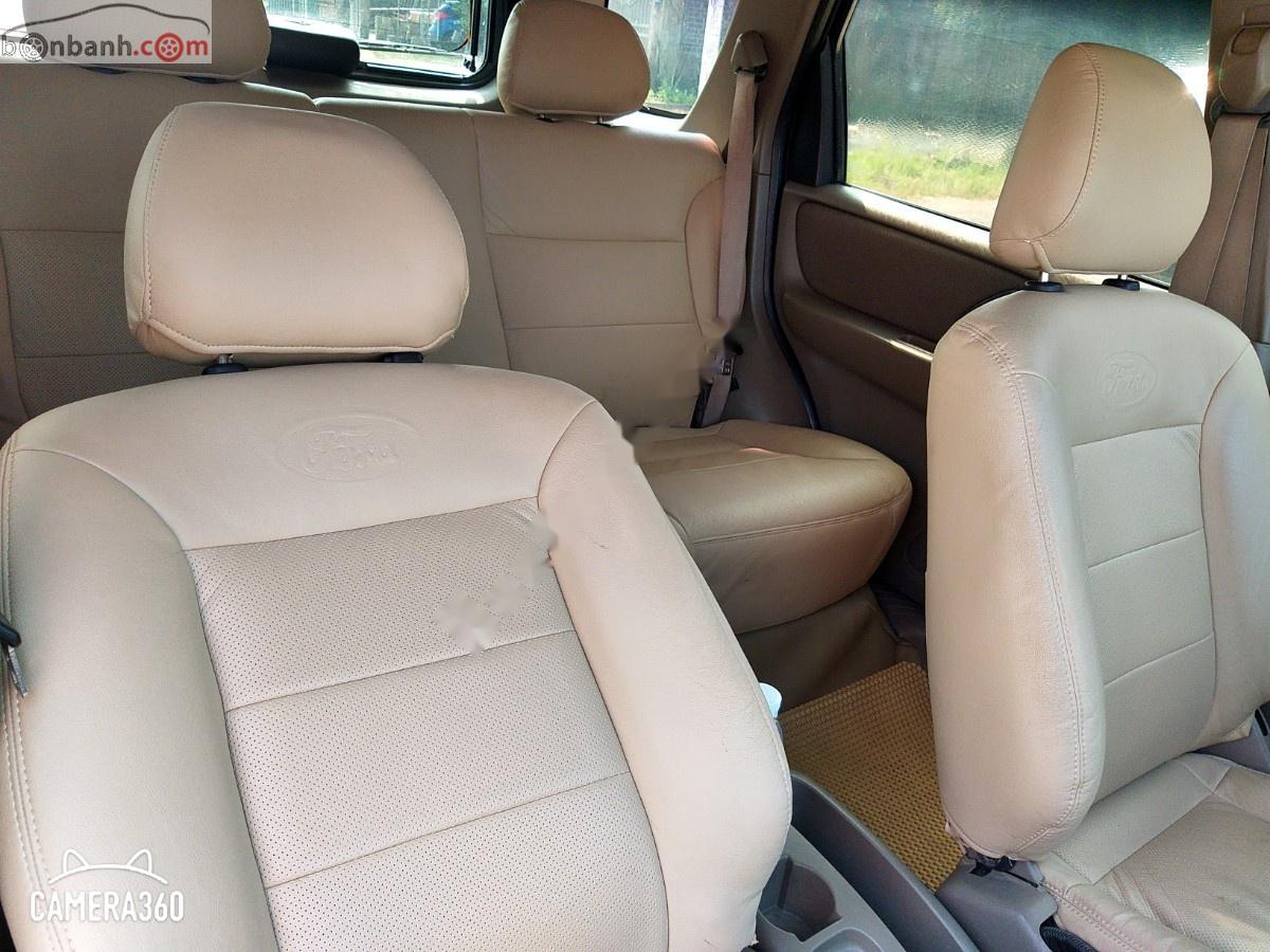 Ford Escape   2004 - Bán ô tô Ford Escape 2.0L 4x4 MT đời 2004, màu đen, số sàn