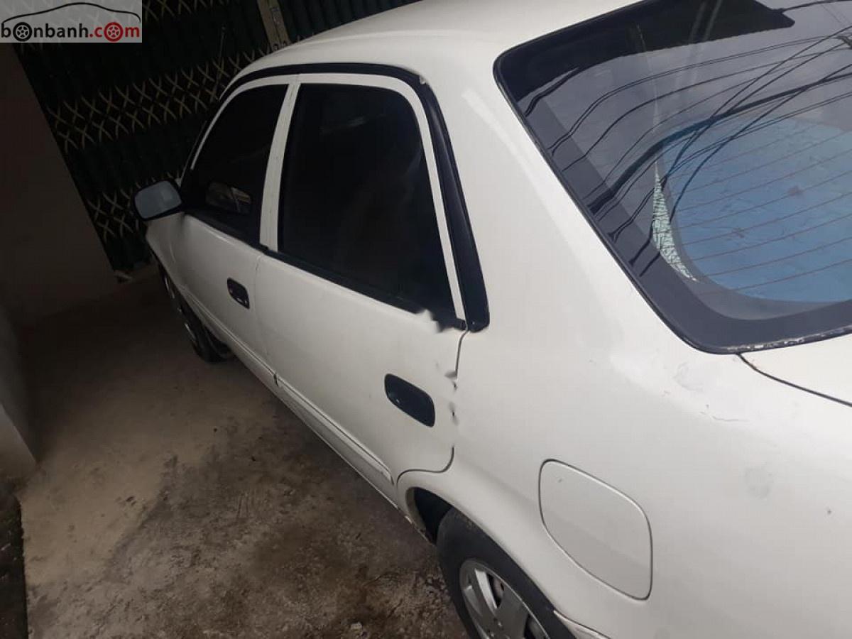 Toyota Corolla 2001 - Bán Toyota Corolla năm 2001, màu trắng giá cạnh tranh