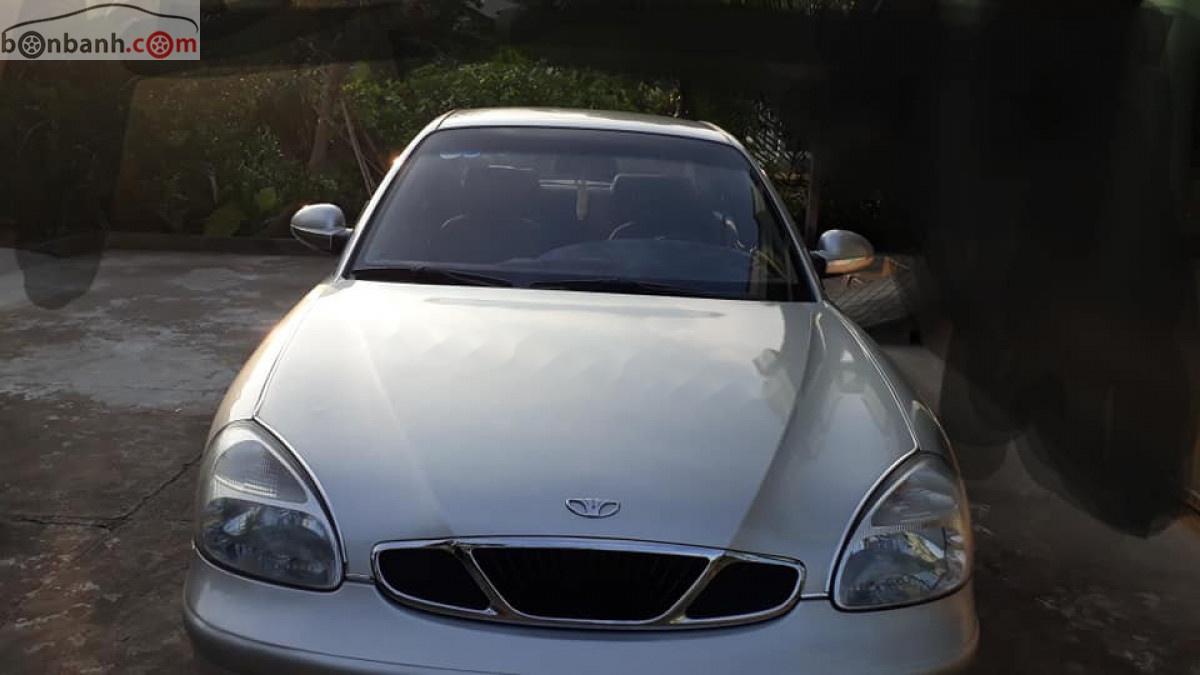 Daewoo Nubira   2004 - Cần bán Daewoo Nubira II 1.6 sản xuất 2004, màu vàng