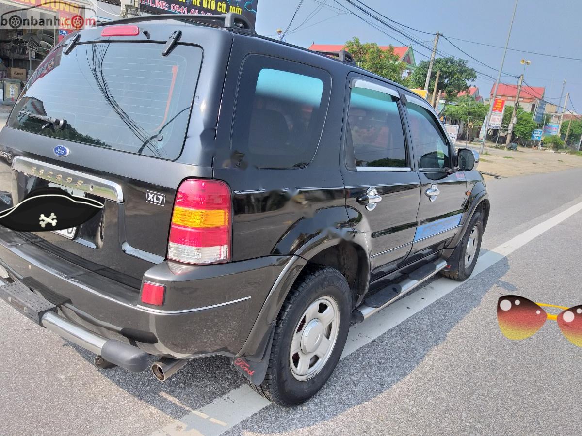 Ford Escape   2004 - Bán ô tô Ford Escape 2.0L 4x4 MT đời 2004, màu đen, số sàn