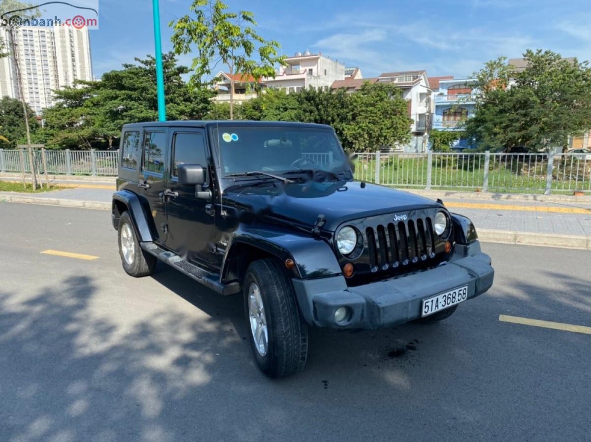 Jeep Wrangler   2009 - Bán Jeep Wrangler Sahara Unlimited năm 2009, màu đen, nhập khẩu  