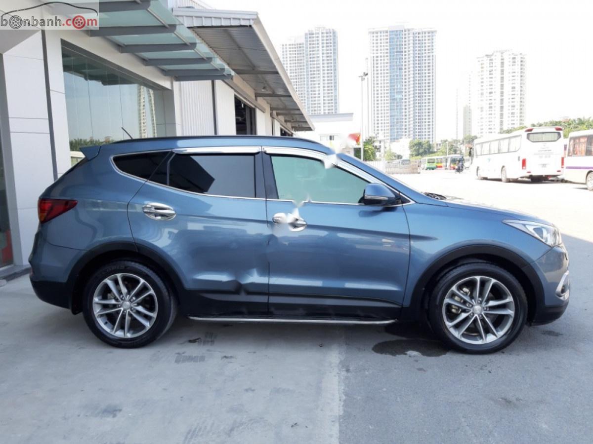 Hyundai Santa Fe 2016 - Bán Hyundai Santa Fe 2.2L AT sản xuất 2016, màu xanh như mới, giá 945tr