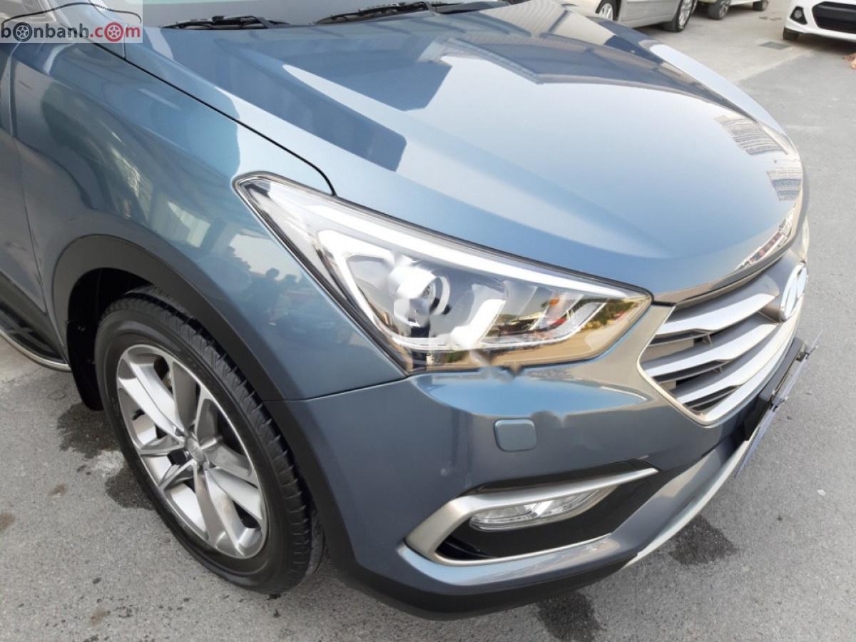 Hyundai Santa Fe 2016 - Bán Hyundai Santa Fe 2.2L AT sản xuất 2016, màu xanh như mới, giá 945tr