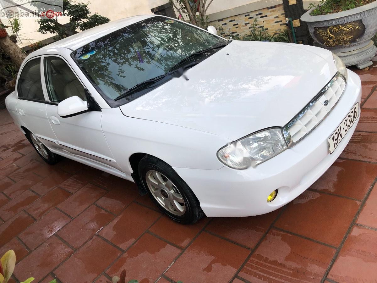 Kia Spectra 2004 - Cần bán lại xe Kia Spectra LS năm sản xuất 2004, màu trắng, giá chỉ 110 triệu