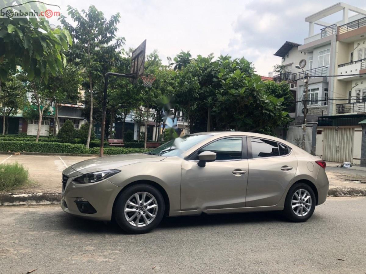 Mazda 3 2017 - Bán Mazda 3 sản xuất năm 2017, màu vàng, 595 triệu xe còn mới lắm