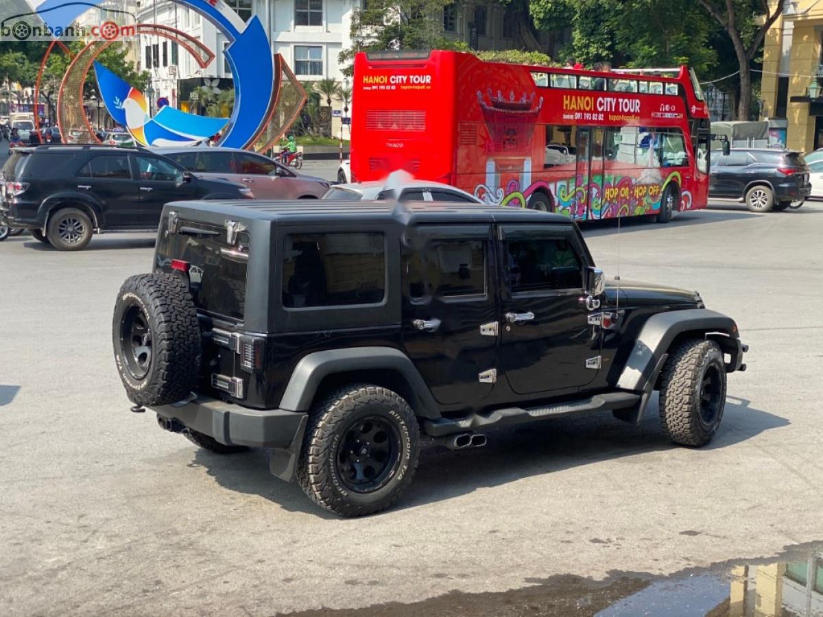 Jeep Wrangler   2015 - Bán Jeep Wrangler Unlimited Sport 3.6 AT sản xuất 2015, màu đen, xe nhập