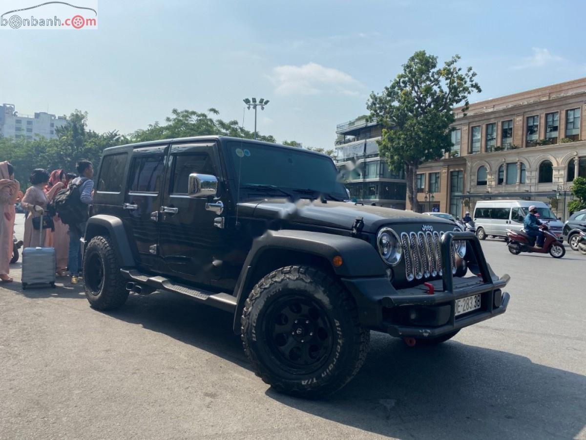 Jeep Wrangler   2015 - Bán Jeep Wrangler Unlimited Sport 3.6 AT sản xuất 2015, màu đen, xe nhập