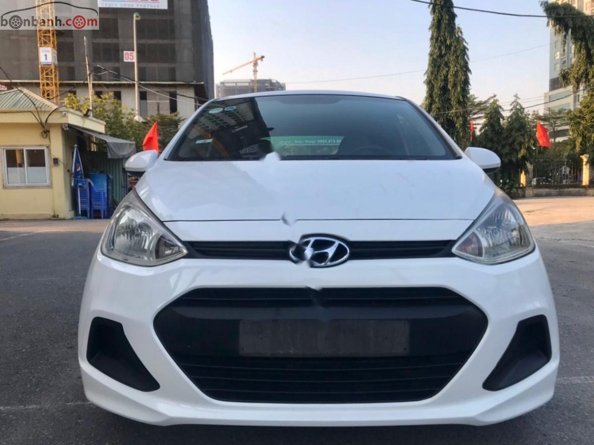 Hyundai Grand i10 2015 - Cần bán Hyundai Grand i10 1.0 MT Base 2015, màu trắng, nhập khẩu