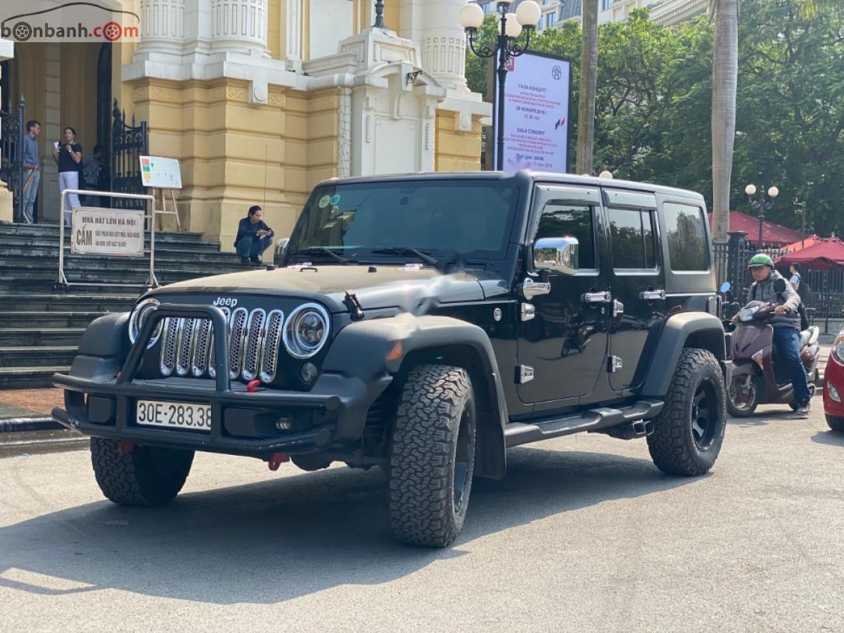 Jeep Wrangler   2015 - Bán Jeep Wrangler Unlimited Sport 3.6 AT sản xuất 2015, màu đen, xe nhập