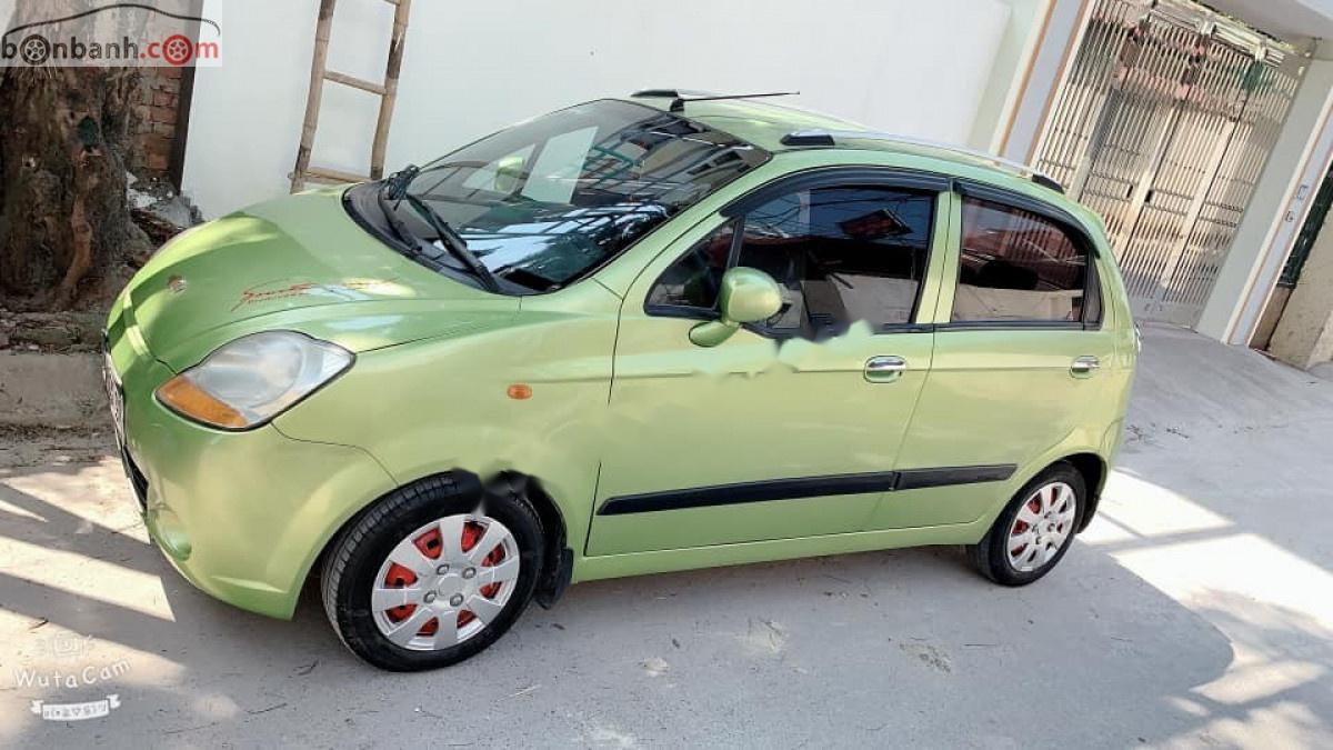 Chevrolet Spark 2009 - Cần bán xe Chevrolet Spark năm sản xuất 2009, màu xanh lục xe còn mới lắm