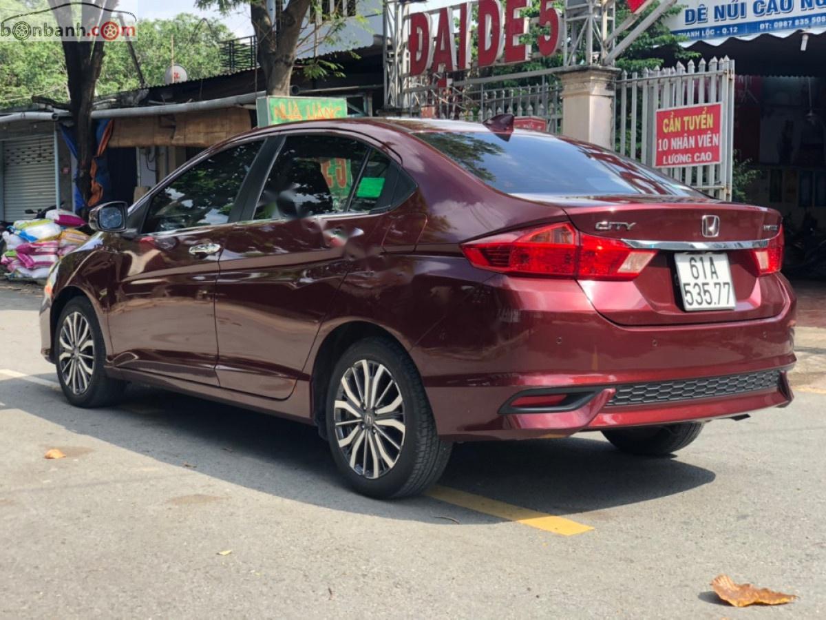 Honda City 2018 - Bán Honda City sản xuất 2018, màu đỏ 560tr xe còn mới lắm