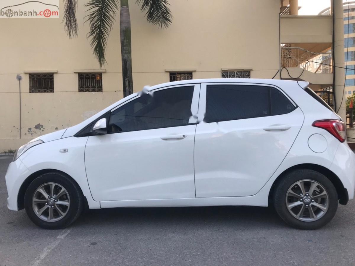 Hyundai Grand i10 2015 - Cần bán Hyundai Grand i10 1.0 MT Base 2015, màu trắng, nhập khẩu