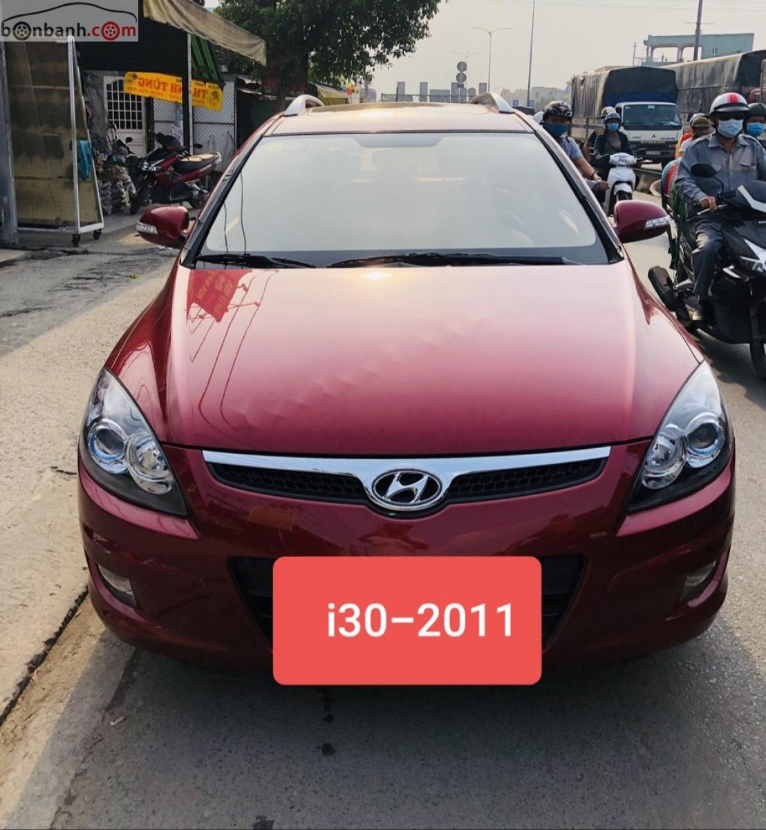 Hyundai i30   2011 - Cần bán Hyundai i30 CW 1.6 AT đời 2011, màu đỏ, nhập khẩu 