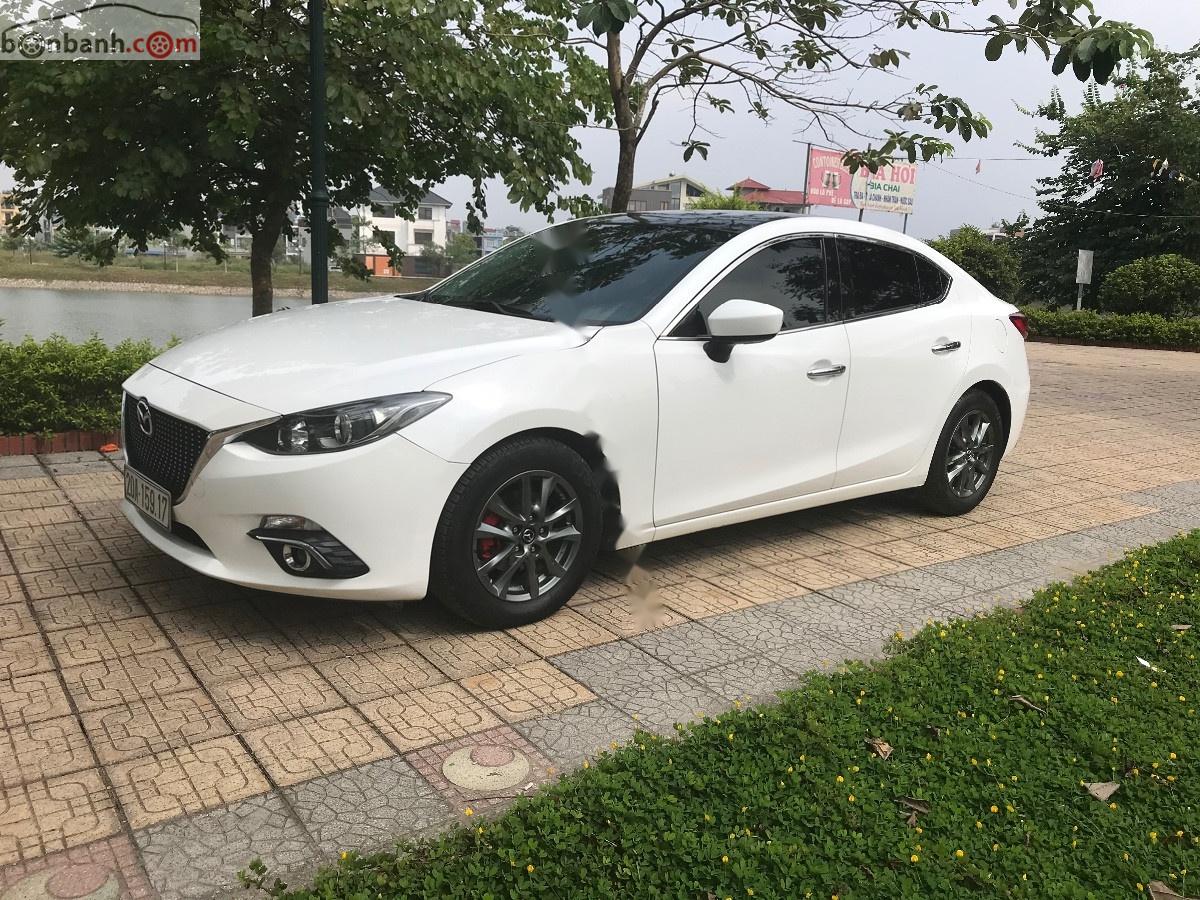 Mazda 3 2016 - Cần bán xe Mazda 3 sản xuất năm 2016, màu trắng số tự động xe còn mới lắm